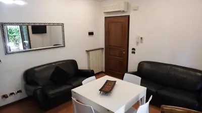 Area soggiorno di App4rent - Appartamento Equilio - pet friendly - giardino esclusivo