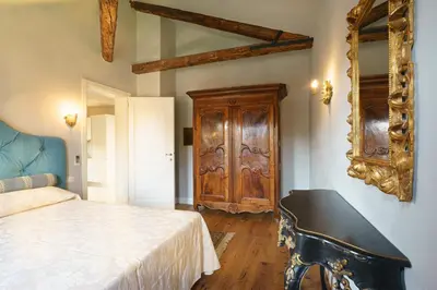 Letto o letti in una camera di Palazzo Veneziano direct at the canal with roof terrace