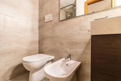 Bagno di enJoy Home - Appartamento a due passi dal Teatro Verdi