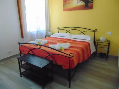 Letto o letti in una camera di La stazione