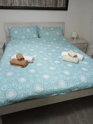 Letto o letti in una camera di Momy House