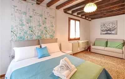 Letto o letti in una camera di Lovely Apartment In Venezia With Wifi