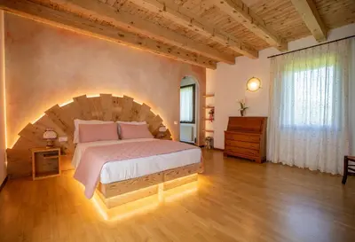 Letto o letti in una camera di GATTO IN VIGNA