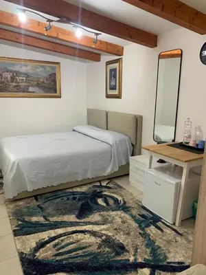 Letto o letti in una camera di Casetta Mortise