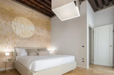 Letto o letti in una camera di San Marco Boutique R&R