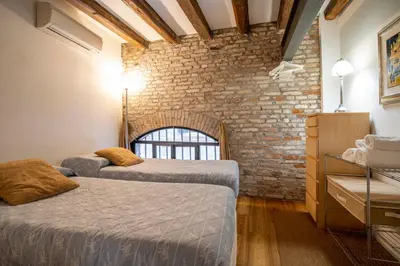 Letto o letti in una camera di Venetian Loft