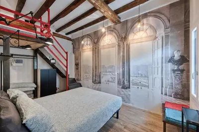 Letto o letti in una camera di Borgo Portello