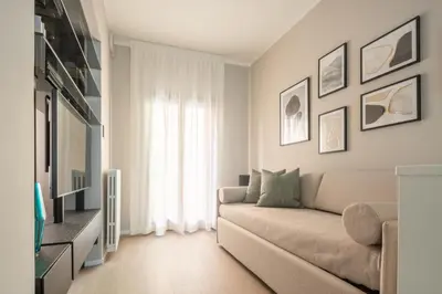 Area soggiorno di Accademia Apartments R&R
