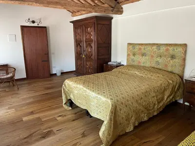Letto o letti in una camera di Villa Iside
