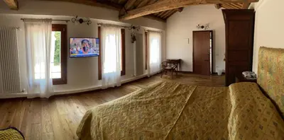 Letto o letti in una camera di Villa Iside