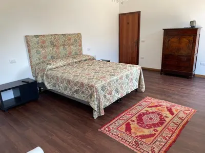 Letto o letti in una camera di Villa Iside