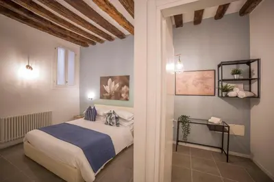 Letto o letti in una camera di La Casetta di Foscolo by Venicevillas