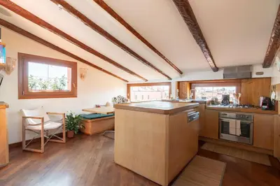 Cucina o angolo cottura di Penthouse with Rooftop Terrace and 360 Views of Venice - Venice5th