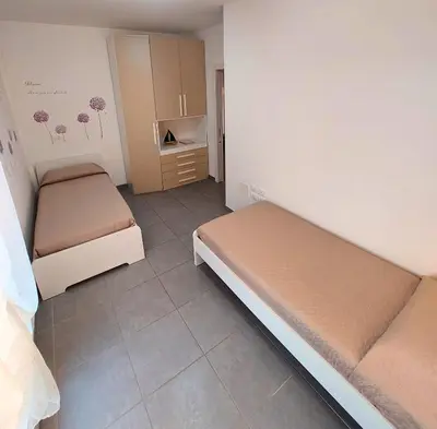 Letto o letti in una camera di Appartamento Palazzo Moretto