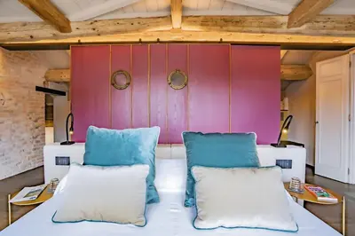 Letto o letti in una camera di Corte Rubbi 11 Secret Terrace Apartment