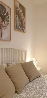 Letto o letti in una camera di Ca' Dea Sarta Venice Apartment