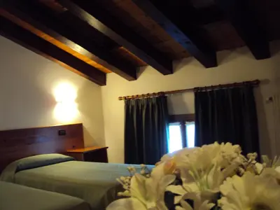 Letto o letti in una camera di Agriturismo Sant' Anna