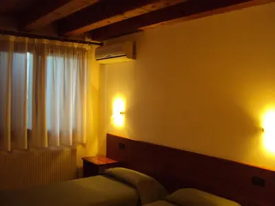 Letto o letti in una camera di Agriturismo Sant' Anna