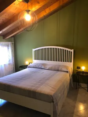 Letto o letti in una camera di Cá Greta
