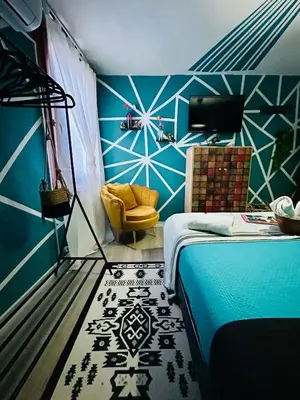 Letto o letti in una camera di Family House di Genny e Nicola small suite