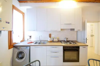 Cucina o angolo cottura di DolceVita Apartments N 489 San Marco
