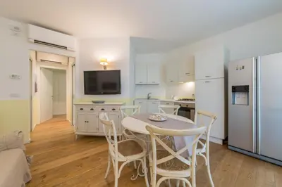 Cucina o angolo cottura di APPARTAMENTO VILLAGGIO CASCINA - JESOLO