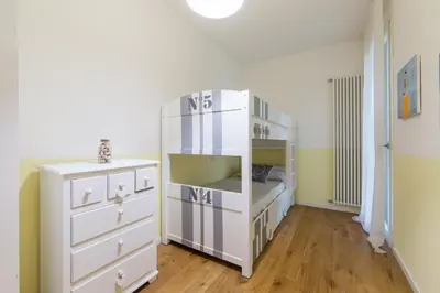 Cucina o angolo cottura di APPARTAMENTO VILLAGGIO CASCINA - JESOLO