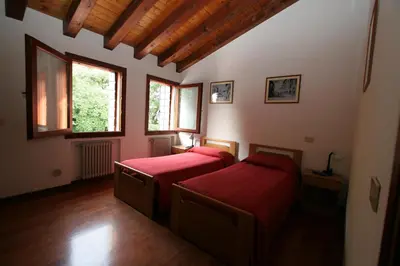 Letto o letti in una camera di Cornarorooms