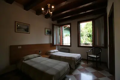 Letto o letti in una camera di Cornarorooms
