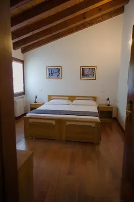 Letto o letti in una camera di Cornarorooms