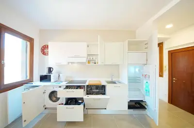 Cucina o angolo cottura di DolceVita Apartments N 491 Biennale