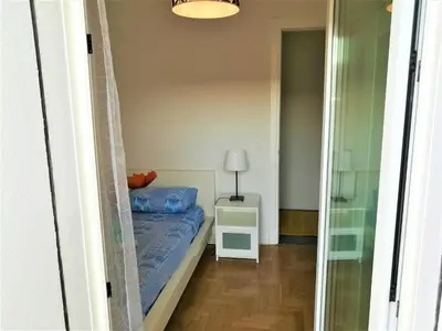 Letto o letti in una camera di ARCHITECT'S APARTMENT PADOVA