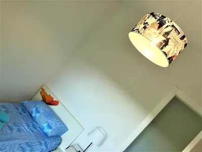 Letto o letti in una camera di ARCHITECT'S APARTMENT PADOVA