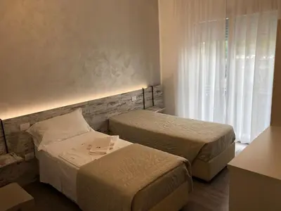Letto o letti in una camera di Alloggi Al Melograno