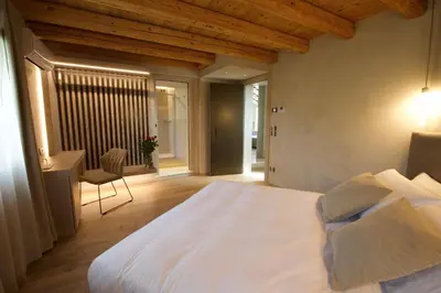 Letto o letti in una camera di Locanda MaMaGiò
