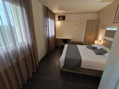 Letto o letti in una camera di Therra Lodge