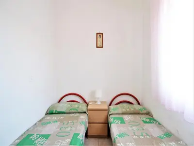 Letto o letti in una camera di Nice holiday home in Rosolina Mare with a terrace