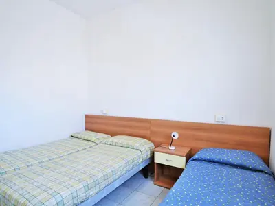 Letto o letti in una camera di Nice apartment in Rosolina Mare near centre