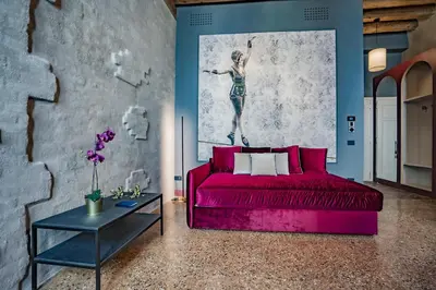 Letto o letti in una camera di Corte Rubbi 7 Deluxe Apartment