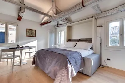 Letto o letti in una camera di Venice Skyline View Studio Apartment M0270428215