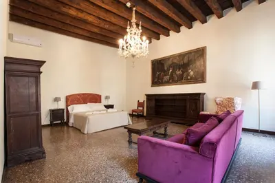 Letto o letti in una camera di Palazzo Valmarana Braga