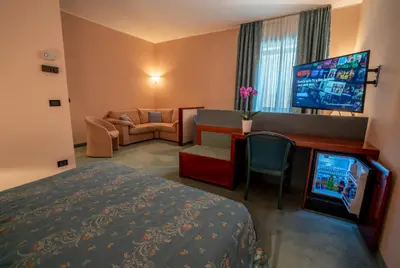 Letto o letti in una camera di Hotel Diana