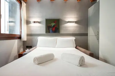 Letto o letti in una camera di VeNICe Cera San Moisè