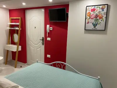 Letto o letti in una camera di LAGUNA BLU Monolocale