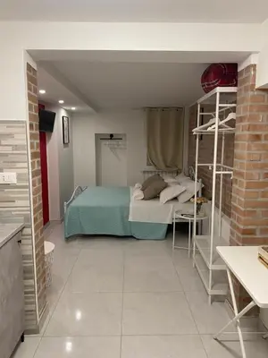 Letto o letti in una camera di LAGUNA BLU Monolocale