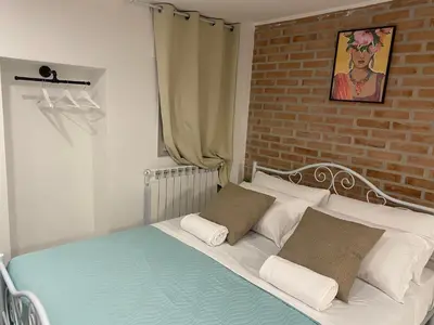 Letto o letti in una camera di LAGUNA BLU Monolocale