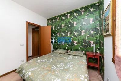 Letto o letti in una camera di Condominio Edda