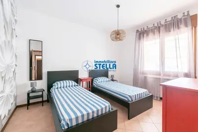 Letto o letti in una camera di Condominio Edda