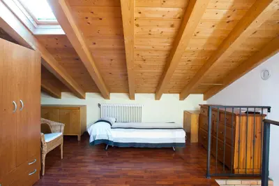 Letto o letti in una camera di Locazioni Turistiche By Max