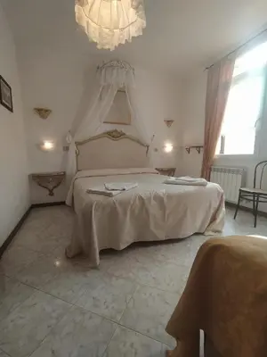 Letto o letti in una camera di Cà Isabella
